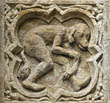 Panel 17:03 - Hybrid creature with a man's body and the head and tail of a spaniel